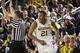 Michigan's stocked up on talent and returns a powerful trio of starters for 2014-15.