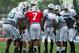 Aug 4, 2014; Cortland, NY, USA; New York Jets quarterback Geno Smith (7) calls a play in the huddle during training camp at SUNY Cortland. Mandatory Credit: Rich Barnes-USA TODAY Sports