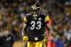 PITTSBURGH, PA - JANUARY 23: Isaac Redman #33 of the Pittsburgh Steelers reacts during their game against the New York Jets in the 2011 AFC Championship game at Heinz Field on January 23, 2011 in Pittsburgh, Pennsylvania. (Photo by Ronald Martinez/Getty Images)