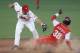 Cuba's Rusney Castillo, right, is tagged out by Canada's second base Shawn Bowman during the first inning of a baseball match at the Pan American Games in Lagos de Moreno, Mexico, Thursday Oct. 20, 2011. (AP Photo/Javier Galeano)
