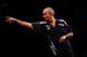 LONDON, ENGLAND - MAY 22: Phil Taylor of England in action during the McCoys Premier League Darts Play-Offs Semi Final match between Raymond van Barneveld and Phil Taylor at O2 Arena on May 22, 2014 in London, England. (Photo by Ben Hoskins/Getty Images)