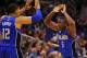 Mar 28, 2014; Orlando, FL, USA; Orlando Magic guard Victor Oladipo (5) and forward Tobias Harris (12) celebrate after Harris drew a foul in overtime as the Magic beat the Charlotte Bobcats 110-105 at Amway Center. Mandatory Credit: David Manning-USA TODAY Sports