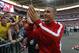 Arsenal's Lukas Podolski celebrates after winning the English FA Cup final soccer match between Arsenal and Hull City at Wembley Stadium in London, Saturday, May 17, 2014. Arsenal won 3-2 after extra-time. (AP Photo/Kirsty Wigglesworth)