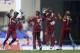 From left, West Indies' Darren Sammy, Sunil Narine, Denesh Ramdin and captain Dwayne Bravo celebrate taking the wicket of England's Luke Wright during their second one-day international cricket match at the Sir Vivian Richards Cricket Ground in St. John's, Antigua, Sunday, March 2, 2014. (AP Photo/Ricardo Mazalan)