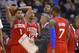 Philadelphia 76ers head coach Brett Brown, center, talks to his team as Lavoy Allen, second from right, looks up toward the scoreboard and Michael Carter-Williams, left, Evan Turner, second from left, and Lorenzo Brown look on during the second half of an NBA basketball game, Sunday, Feb. 9, 2014, in Los Angeles. The Clippers won 123-78. (AP Photo/Mark J. Terrill)