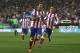 Atletico's Mandzukic, centre, celebrates his goal with team mates during a Spanish Supercup second leg soccer match between Real Madrid and Atletico Madrid at Vicente Calderon stadium in Madrid, Spain, Friday, Aug. 22, 2014. (AP Photo/Andres Kudacki)