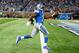 Aug 22, 2014; Detroit, MI, USA; Detroit Lions running back Reggie Bush (21) high steps into the end zone during the first quarter against the Jacksonville Jaguars at Ford Field. Mandatory Credit: Andrew Weber-USA TODAY Sports