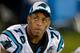 CHARLOTTE, NC - AUGUST 08: Greg Hardy #76 of the Carolina Panthers watches from the bench during the fourth quarter of a loss to the Buffalo Bills at Bank of America Stadium on August 8, 2014 in Charlotte, North Carolina. Buffalo won 20-18. (Photo by Grant Halverson/Getty Images)