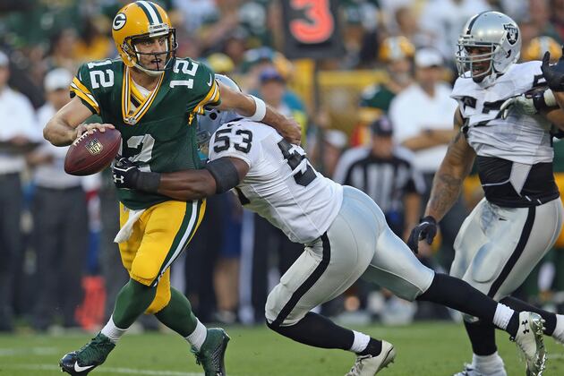 Rodgers Has 2 TDs, Packers Beat Raiders 31-21