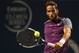 TORONTO, ON - AUGUST 09: Feliciano Lopez of Spain returns a shot to Roger Federer of Switzerland in the semifinals during Rogers Cup at Rexall Centre at York University on August 9, 2014 in Toronto, Canada. (Photo by Ronald Martinez/Getty Images)