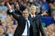 Everton's manager Roberto Martínez, left, and Arsenal's manager Arsene Wenger react during the English Premier League soccer match between Everton and Arsenal at Goodison Park, in Liverpool, England, Saturday, Aug. 23, 2014. (AP Photo/Rui Vieira)