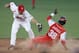 Cuba's Rusney Castillo, right, is tagged out by Canada's second base Shawn Bowman during the first inning of a baseball match at the Pan American Games in Lagos de Moreno, Mexico, Thursday Oct. 20, 2011. (AP Photo/Javier Galeano)