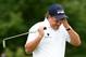 PARAMUS, NJ - AUGUST 23: Phil Mickelson reacts after missing a putt for birdie on the 10th green during the third round of The Barclays at The Ridgewood Country Club on August 23, 2014 in Paramus, New Jersey. (Photo by Ross Kinnaird/Getty Images)