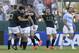 South Africa's players celebrate defeating Argentina in a Rugby Championship match in Salta, Argentina, Saturday, Aug. 23, 2014. (AP Photo/Victor R. Caivano)