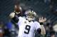New Orleans Saints' Drew Brees warms up before an NFL wild-card playoff football game against the Philadelphia Eagles, Saturday, Jan. 4, 2014, in Philadelphia. (AP Photo/Matt Rourke)