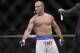 Junior Dos Santos motions to opponent Mark Hunt before fighting in the UFC 160 mixed martial arts heavyweight bout, Saturday, May 25, 2013, in Las Vegas. (AP Photo/Julie Jacobson)