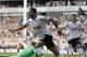 Tottenham Hotspur's Nacer Chadli, left, celebrates his goal against Queens Park Rangers during their English Premier League soccer match at White Hart Lane, London, Sunday, Aug. 24, 2014. (AP Photo/Sang Tan)