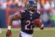 CHICAGO, IL - NOVEMBER 10: Matt Forte #22 of the Chicago Bears runs against the Detroit Lions at Soldier Field on November 10, 2013 in Chicago, Illinois. The Lions defeated the Bears 21-19. (Photo by Jonathan Daniel/Getty Images)