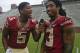 Florida State quarterback Jameis Winston (5) interviews defensive back Ronald Darby (3) during their NCAA college football media day on Sunday, Aug. 10, 2014, in Tallahassee, Fla. (AP Photo/Phil Sears)