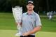 PARAMUS, NJ - AUGUST 24: Hunter Mahan celebrates with the tournament trophy after winning of The Barclays at The Ridgewood Country Club on August 24, 2014 in Paramus, New Jersey. (Photo by Ross Kinnaird/Getty Images)