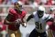 San Francisco 49ers quarterback Colin Kaepernick (7) drops back to pass as San Diego Chargers defensive end Kendall Reyes (91) applies pressure during the first quarter of an NFL preseason football game in Santa Clara, Calif., Sunday, Aug. 24, 2014. (AP Photo/Marcio Jose Sanchez)