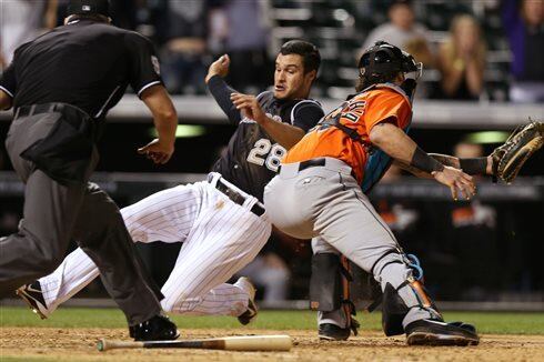 Bergman Earns 1st Win as Rockies Beat Marlins 7-4