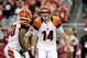 Aug 24, 2014; Glendale, AZ, USA; Cincinnati Bengals quarterback Andy Dalton (14) talks to running back Cedric Peerman (30) prior to the snap during the first half against the Arizona Cardinals at University of Phoenix Stadium. Mandatory Credit: Matt Kartozian-USA TODAY Sports
