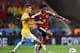 FORTALEZA, BRAZIL - JULY 04: Oscar of Brazil challenges Juan Guillermo Cuadrado of Colombia during the 2014 FIFA World Cup Brazil Quarter Final match between Brazil and Colombia at Castelao on July 4, 2014 in Fortaleza, Brazil. (Photo by Laurence Griffiths/Getty Images)