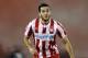 ATHENS,GREECE - JANUARY 12: Kostas Manolas of Olympiacos during the Greek Superleague match between Atromitos Athinon and Olympiacos at the Peristeri Stadium on January 12, 2014 in Athens,Greece. (Photo by Aris Messins/EuroFootball/Getty Images)