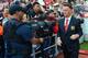 SUNDERLAND, ENGLAND - AUGUST 24: Manager Louis van Gaal of Manchester United looks on as he is filmed by a TV cameraman prior to the Barclays Premier League match between Sunderland and Manchester United at Stadium of Light on August 24, 2014 in Sunderland, England. (Photo by Michael Regan/Getty Images)