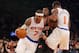 Feb 5, 2014; New York, NY, USA; New York Knicks small forward Carmelo Anthony (7) drives on Portland Trailblazers shooting guard Wesley Matthews (2) in front of New York Knicks power forward Amar'e Stoudemire (1) during the fourth quarter of a game at Madison Square Garden. The Trailblazers defeated the Knicks 94-90. Mandatory Credit: Brad Penner-USA TODAY Sports