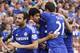 Chelsea's Diego Costa, second left, celebrates his goal against Leicester City with teammates during their English Premier League soccer match at Stamford Bridge, London, Saturday, Aug. 23, 2014. (AP Photo/Sang Tan)