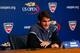 Roger Federer answers questions at a press conference prior to the start of the 2014 U.S. Open.