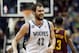 Minnesota Timberwolves' Kevin Love smiles after a three-point shot in the second half of an NBA basketball game against the Cleveland Cavaliers, Wednesday, Nov. 13, 2013, in Minneapolis. Love led the Timberwolves with 33 points in the team's 124-95 win. (AP Photo/Jim Mone)