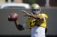 UCLA quarterback Brett Hundley throws a pass during NCAA college football practice Wednesday, Aug. 20, 2014, in Los Angeles. (AP Photo/Jae C. Hong)