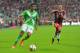 Bayern's Mario Goetze, right, and Wolfburg's Luiz Gustavo from Brazil challenge for the ball during the soccer match between FC Bayern Munich and VfL Wolfsburg in the Allianz Arena in Munich, Germany, on Friday, Aug. 22, 2014. (AP Photo/Kerstin Joensson)