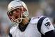 New England Patriots quarterback Tom Brady runs onto the field before an NFL preseason football game against the Carolina Panthers Friday, Aug. 22, 2014, in Foxborough, Mass. (AP Photo/Charles Krupa)
