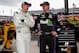 BRISTOL, TN - AUGUST 22: Kyle Busch, driver of the #18 Doublemint Toyota, speaks with Denny Hamlin, driver of the #11 FedEx Ground Toyota, in the garage area during practice for the NASCAR Sprint Cup Series Irwin Tools Night Race at Bristol Motor Speedway on August 22, 2014 in Bristol, Tennessee. (Photo by Gregory Shamus/Getty Images)