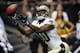 New Orleans Saints wide receiver Brandin Cooks (10) tries in vain to pull in a long pass in the second half of a NFL preseason football game against the Tennessee Titans in New Orleans, Friday, Aug. 15, 2014. (AP Photo/Bill Haber)
