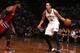 BROOKLYN, NY - MAY 12: Shaun Livingston #14 of the Brooklyn Nets handles the ball against LeBron James #6 of the Miami Heat in Game Four of the Eastern Conference Semifinals during the 2014 NBA Playoffs on May 12, 2014 at Barclays Center in Brooklyn. NOTE TO USER: User expressly acknowledges and agrees that, by downloading and or using this photograph, User is consenting to the terms and conditions of the Getty Images License Agreement. Mandatory Copyright Notice: Copyright 2014 NBAE (Photo by Nathaniel S. Butler/NBAE via Getty Images)