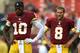LANDOVER, MD - AUGUST 07: Quarterback Robert Griffin III #10, quarterback Kirk Cousins #8, and quarterback Colt McCoy #16 of the Washington Redskins look on before playing the New England Patriots during their preseason NFL game at FedExField on August 7, 2014 in Landover, Maryland. (Photo by Patrick Smith/Getty Images)