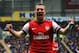 HULL, ENGLAND - APRIL 20: Lukas Podolski of Arsenal celebrates scoring his sides third goal during the Barclays Premier League match between Hull City and Arsenal at KC Stadium on April 20, 2014 in Hull, England. (Photo by Matthew Lewis/Getty Images)