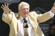 John Madden speaks during the enshrinement ceremony at the Pro Football Hall of Fame, Saturday, August 5, 2006, in Canton, Ohio. Madden was inducted in the Class of 2006. (AP Photo/Tony Dejak)