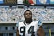 CHARLOTTE, NC - SEPTEMBER 8: Sean Gilbert #94 of the Carolina Panthers looks on during the game against the Baltimore Ravens on September 8, 2002 at Ericsson Stadium in Charlotte, North Carolina. The Panthers defeated the Ravens 10-7. (Photo by Craig Jones/Getty Images)