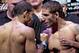 Mixed Martial Arts, MMA, fighters Chad Mendes, from the US, right, and Jose Aldo, from Brazil, gesture for pictures at the weigh-in event ahead of the Ultimate Fighting Championship, UFC, 142 in Rio de Janeiro, Brazil, Friday, Jan. 13, 2012. Aldo and Mendes will fight Friday for the UFC featherweight title. (AP Photo/Felipe Dana)