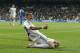 Real Madrid's Angel Di Maria, center, celebrates his goal during a Spanish La Liga soccer match against Almeria at the Santiago Bernabeu stadium in Madrid, Spain, Saturday, April 12, 2014. (AP Photo/Andres Kudacki)