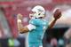 Miami Dolphins quarterback Brady Quinn (7) warms up before the start of an NFL preseason football game against the Tampa Bay Buccaneers Saturday, Aug. 16, 2014, in Tampa, Fla. (AP Photo/Brian Blanco)