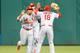 Jon Jay, Matt Holliday and Oscar Taveras celebrate after defeating the Pirates Monday night.