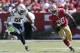 San Francisco 49ers running back Carlos Hyde (28) runs from San Diego Chargers outside linebacker Tourek Williams (58) during the second quarter of an NFL preseason football game in Santa Clara, Calif., Sunday, Aug. 24, 2014. (AP Photo/Marcio Jose Sanchez)