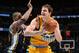 DENVER, CO - APRIL 12: Timofey Mozgov #25 of the Denver Nuggets handles the ball against the Utah Jazz on April 12, 2014 at the Pepsi Center in Denver, Colorado. NOTE TO USER: User expressly acknowledges and agrees that, by downloading and/or using this Photograph, user is consenting to the terms and conditions of the Getty Images License Agreement. Mandatory Copyright Notice: Copyright 2014 NBAE (Photo by Garrett W. Ellwood/NBAE via Getty Images)